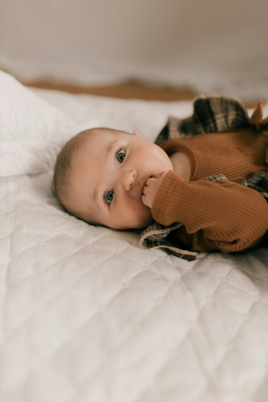 International maternity nurse caring for newborn