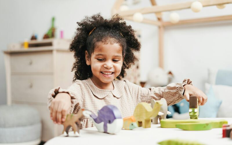 Professional governess teaching child at home