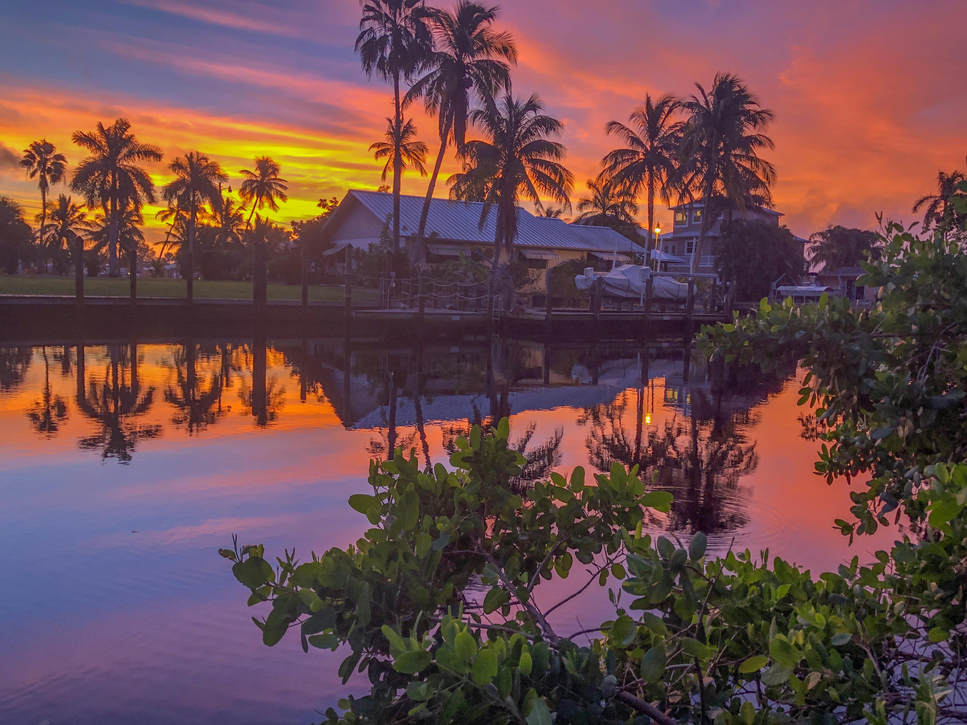 Palm Beach waterfront at sunset