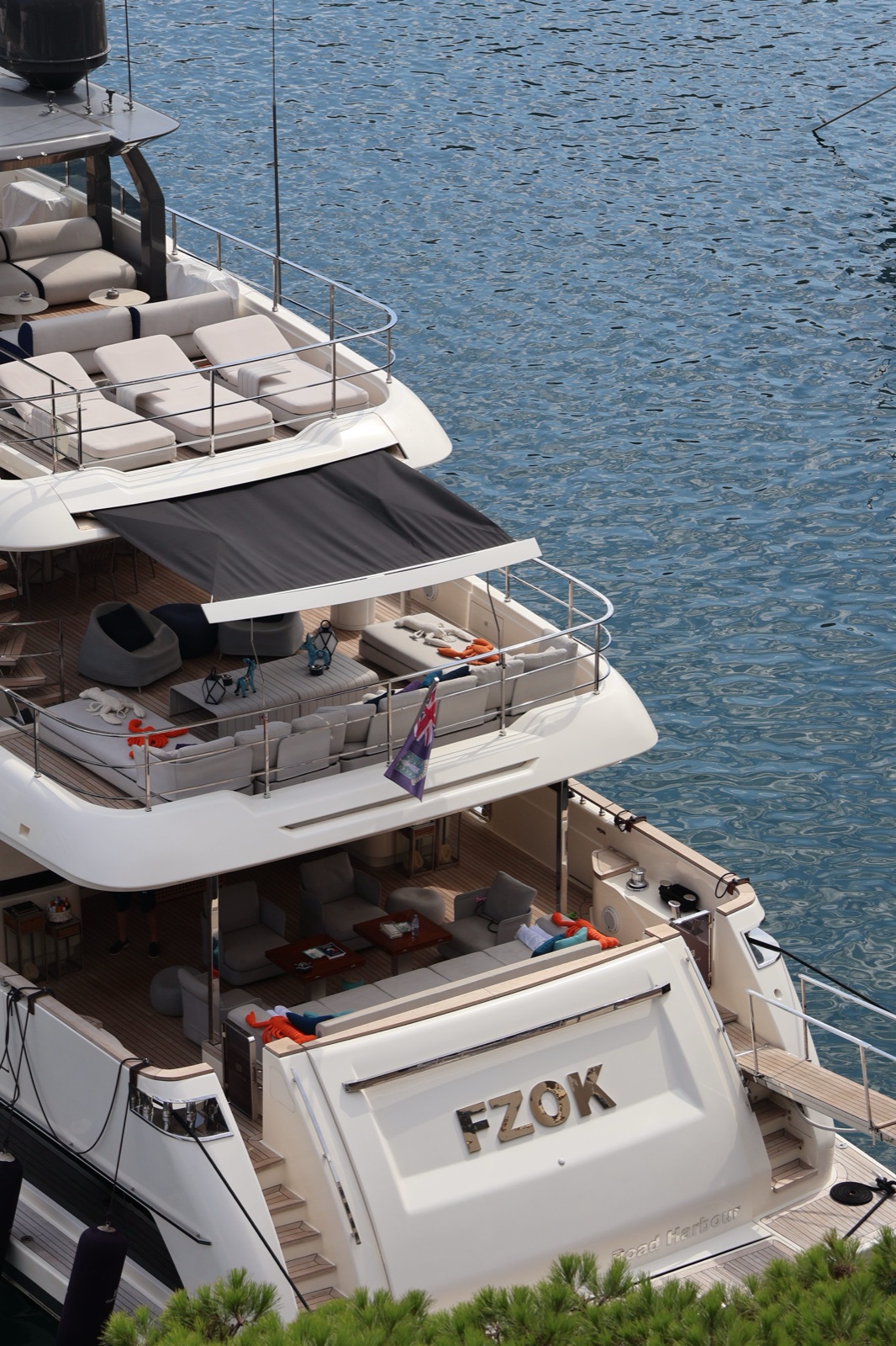 Multi-deck superyacht moored on the Riviera